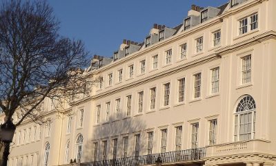 Cream-painted Regency terrace with balconies and dormer windows
